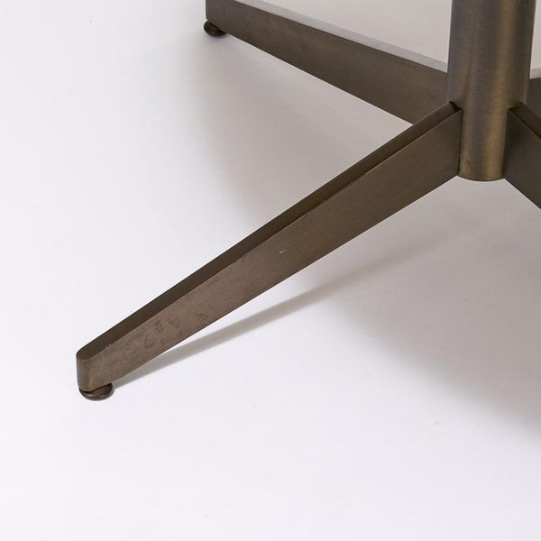 Round walnut dining table with bronze base