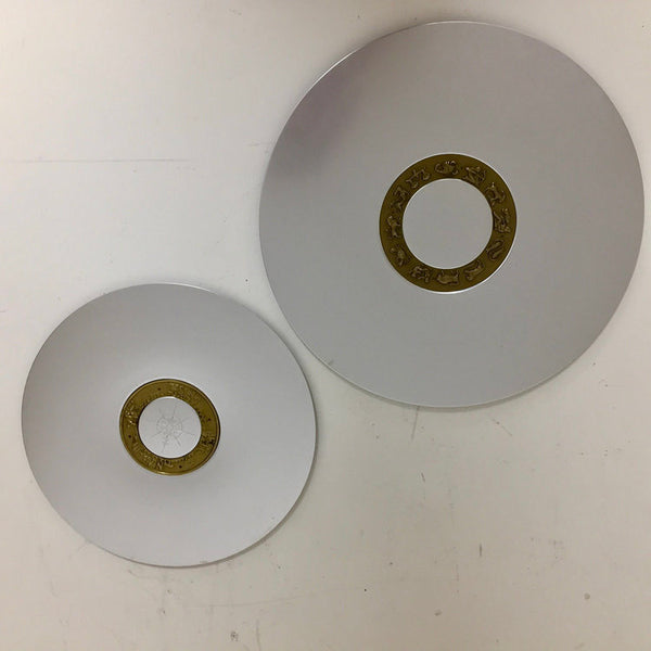 Pair of large aluminum circular trays designed