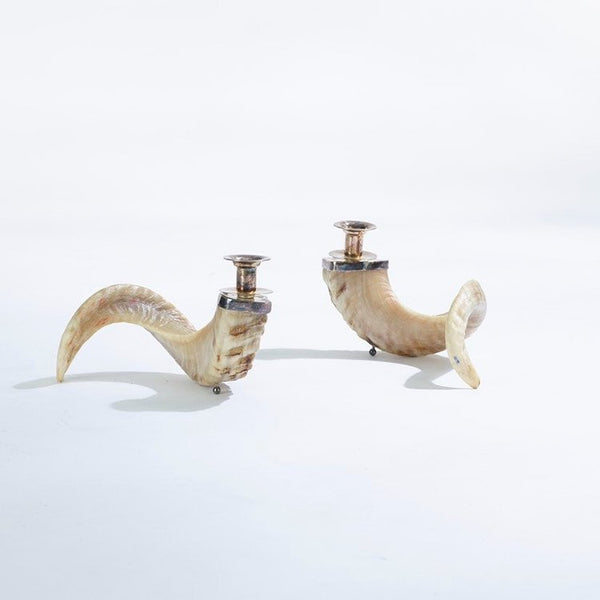 Pair of ram’s horn candle holders