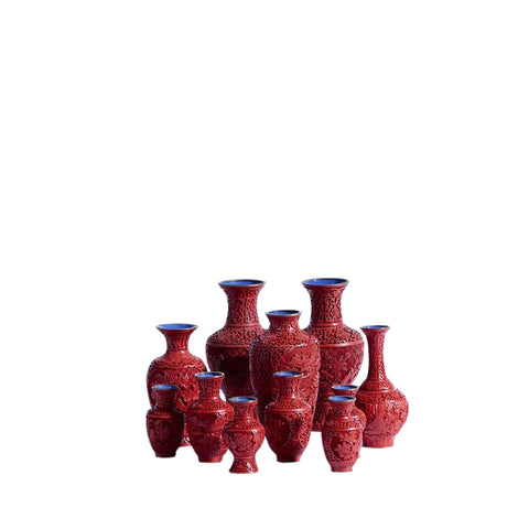 Set of 11 vintage cinnabar vases with blue enamel interior