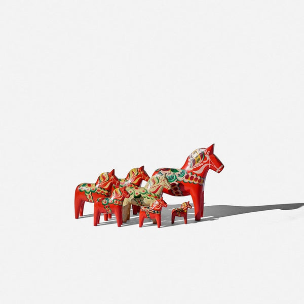 Set of seven Dala horses by Nils Olsson