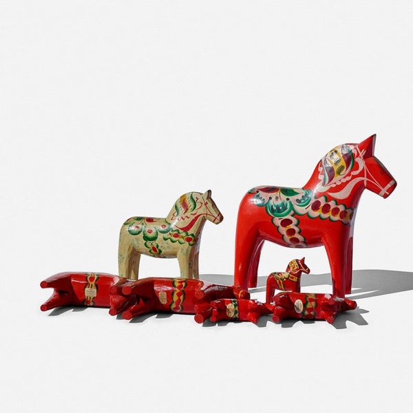 Set of seven Dala horses by Nils Olsson