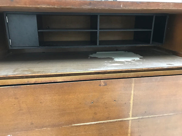 Shelving out of a George Nelson for Herman Miller secretary