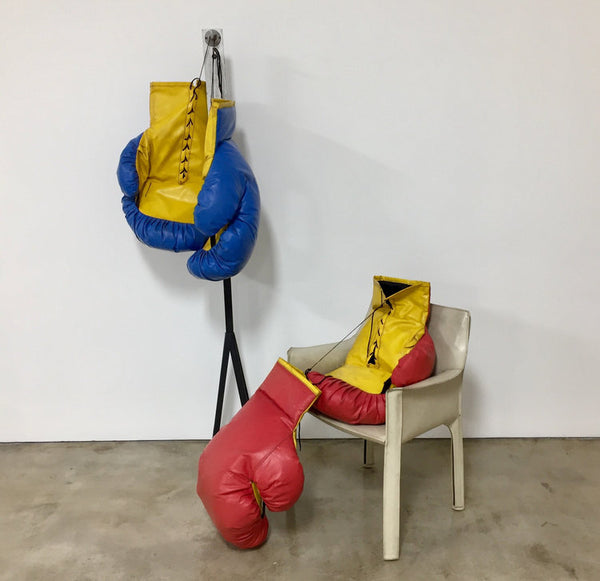 Two pair of giant sized pop art boxing gloves