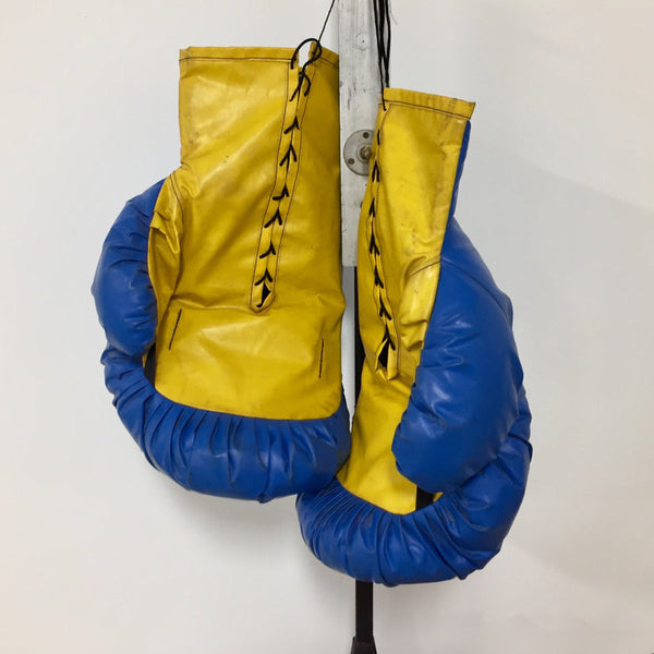Two pair of giant sized pop art boxing gloves