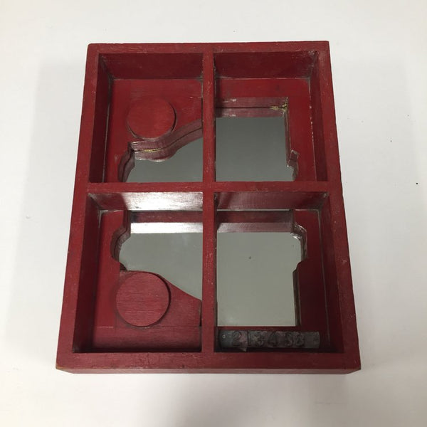 Vintage industrial mirror in the style of Louise Nevelson