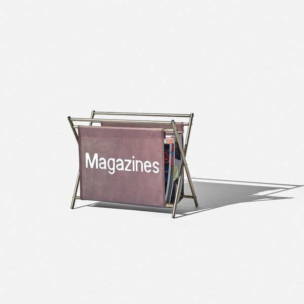 Vintage folding magazine rack made out of fabric and chrome