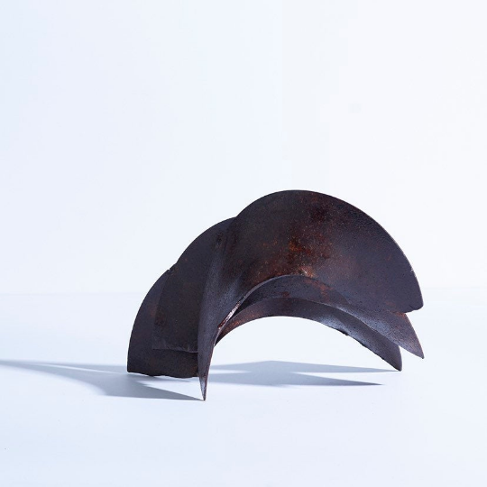 Welded iron brutalist blade sculpture in the style of Richard Serra