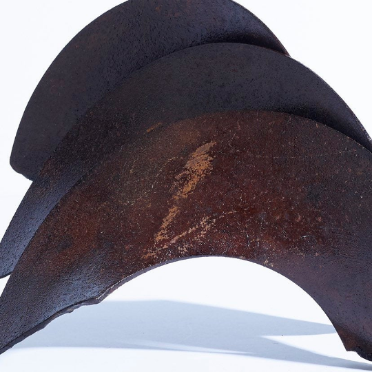 Welded iron brutalist blade sculpture in the style of Richard Serra